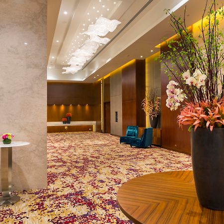 Hyatt Regency Manila City Of Dreams Paranaque City Exterior photo The lobby of the hotel