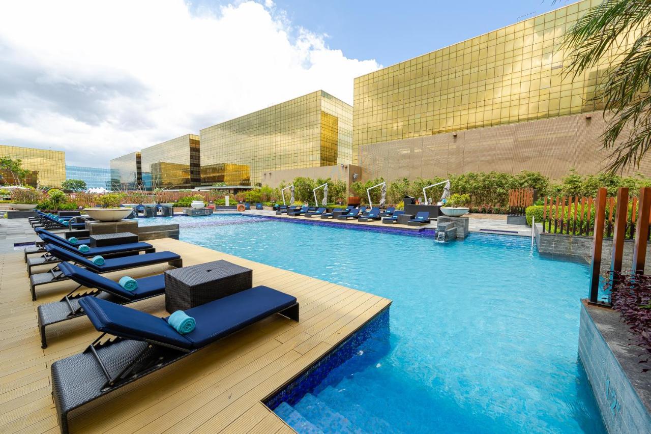 Hyatt Regency Manila City Of Dreams Paranaque City Exterior photo The pool at the Westin